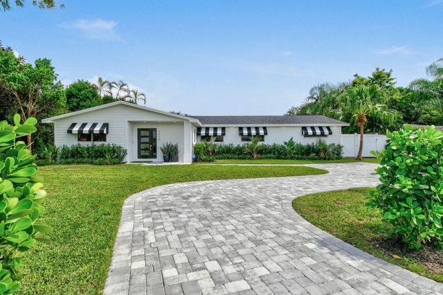 $1,490,000 | 7710 West Lake Drive | Lake Clarke Shores