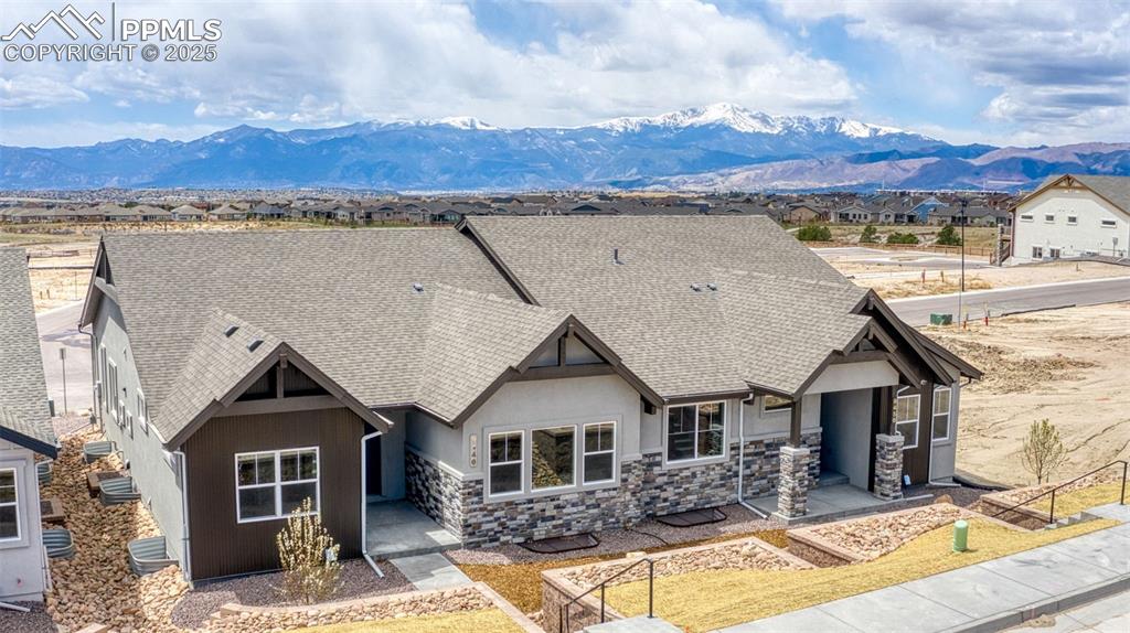 a aerial view of a house with a patio