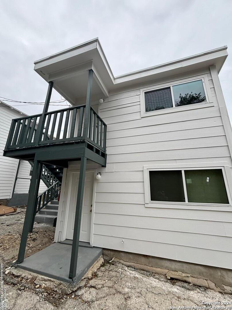 a view of a house with a deck