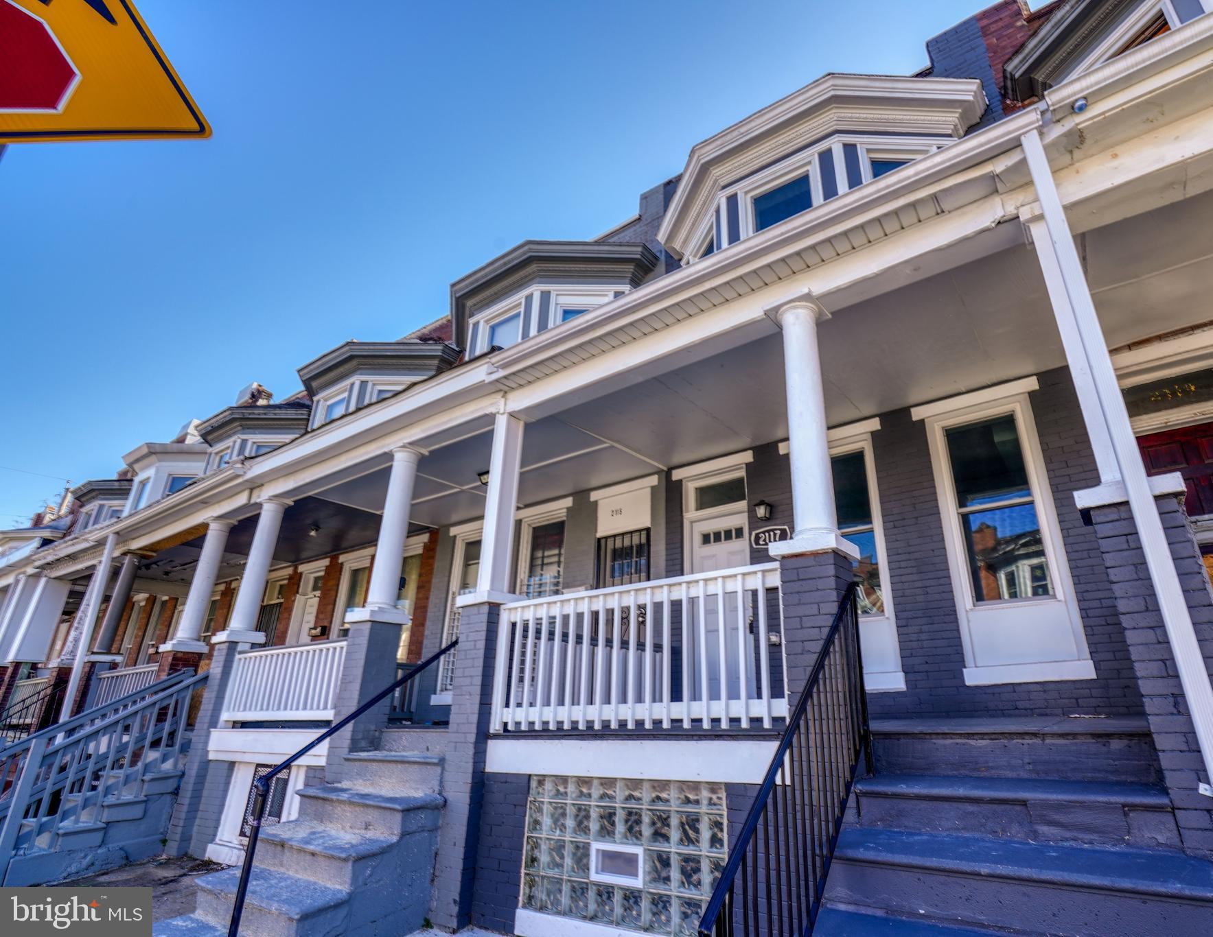 front view of a house with a deck