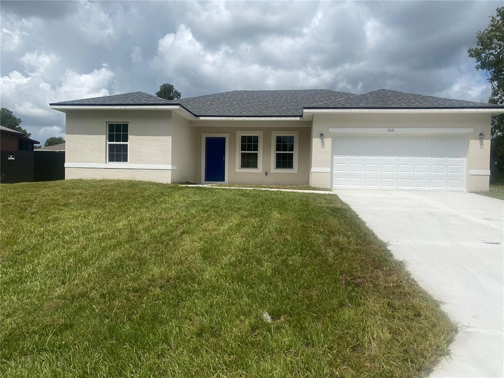 front view of house with a yard