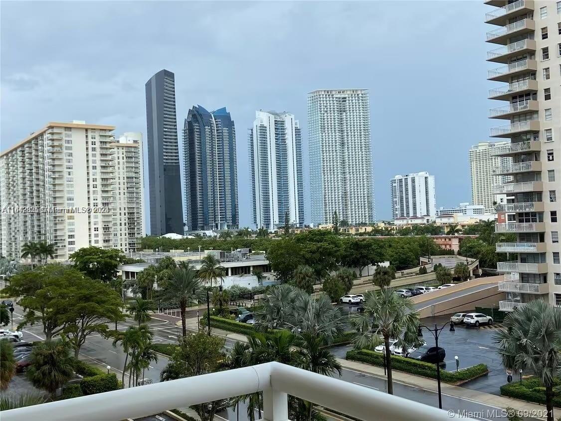 a view of a city with tall buildings