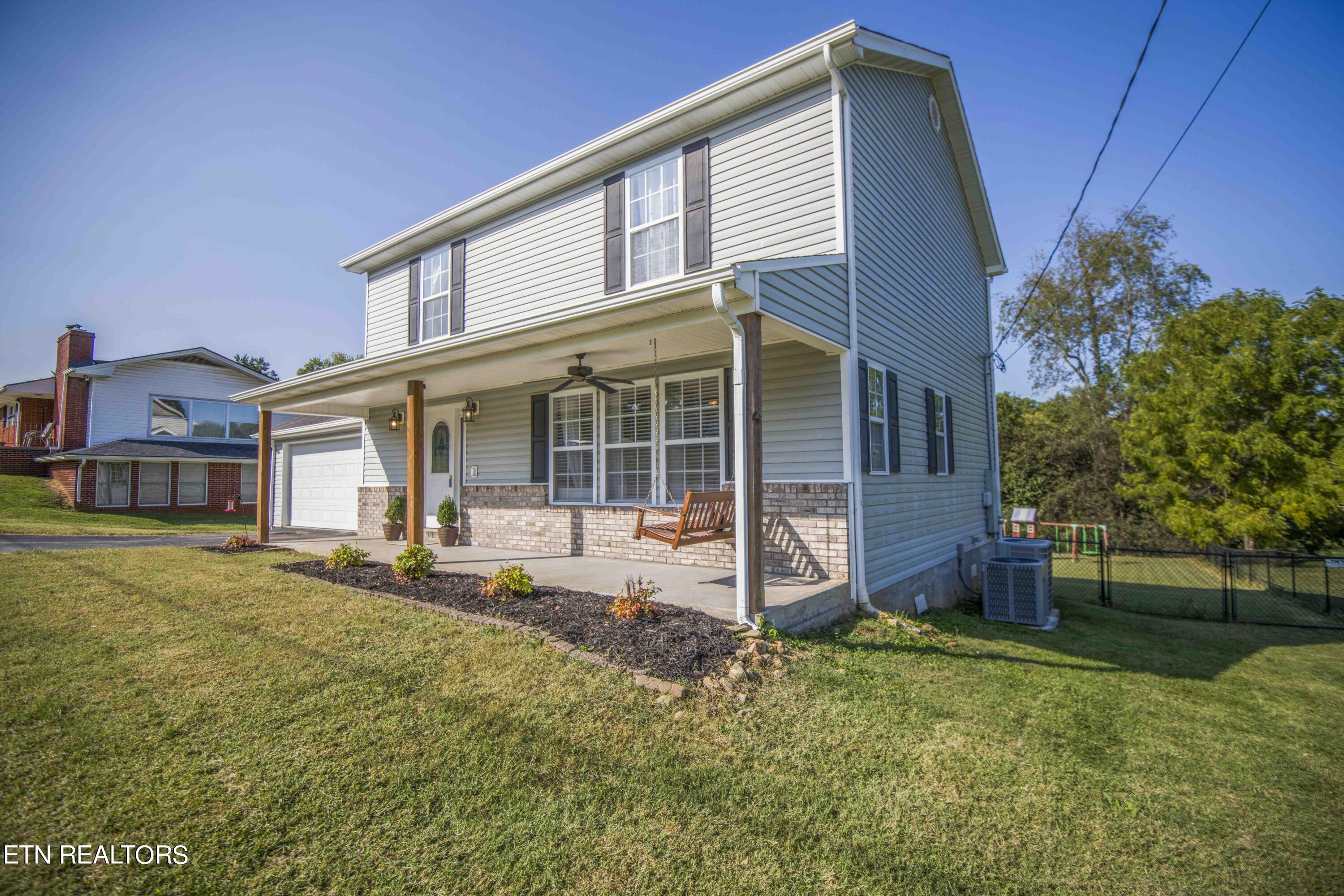 Front of home with covered porch