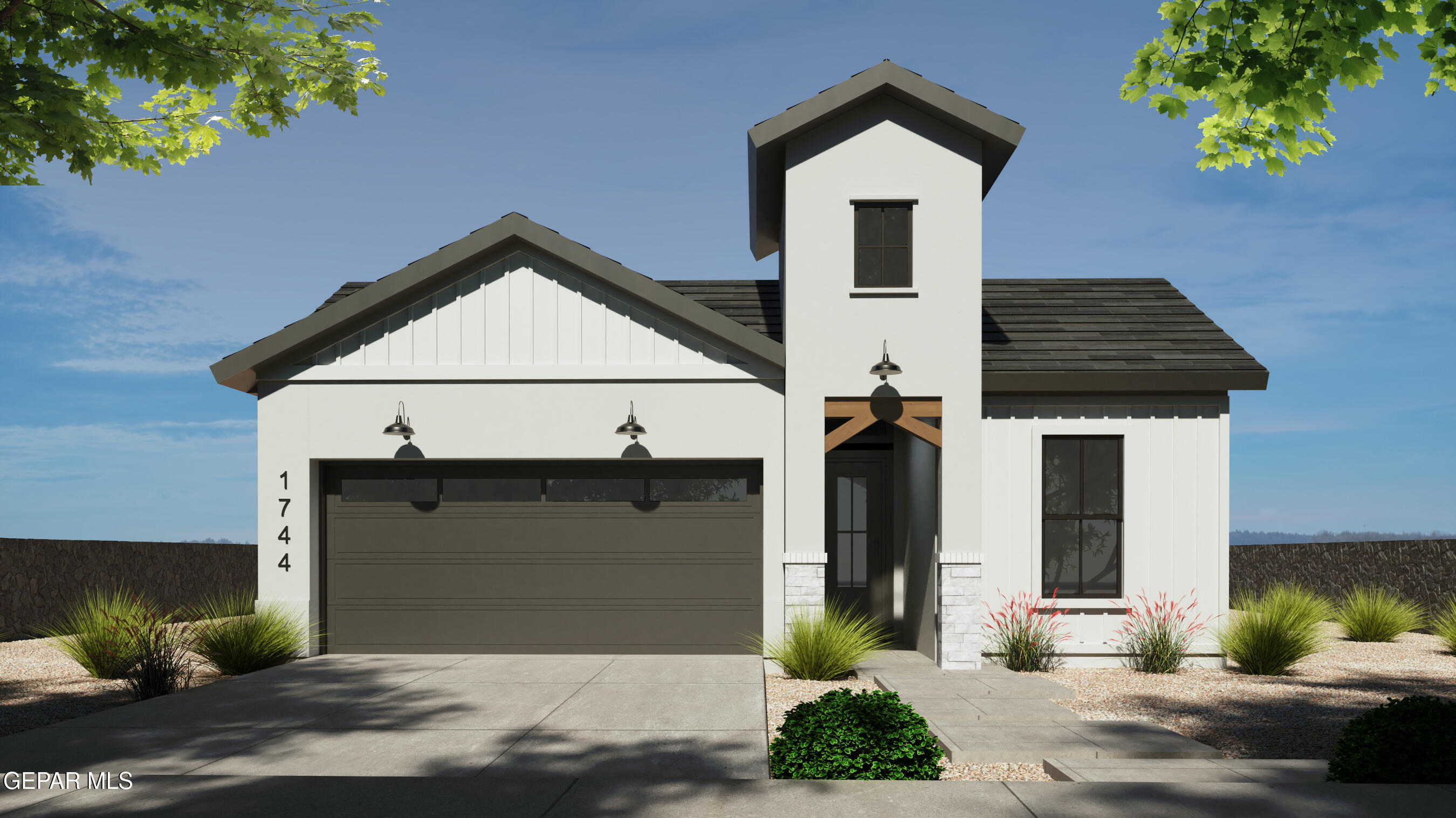 a front view of a house with garage