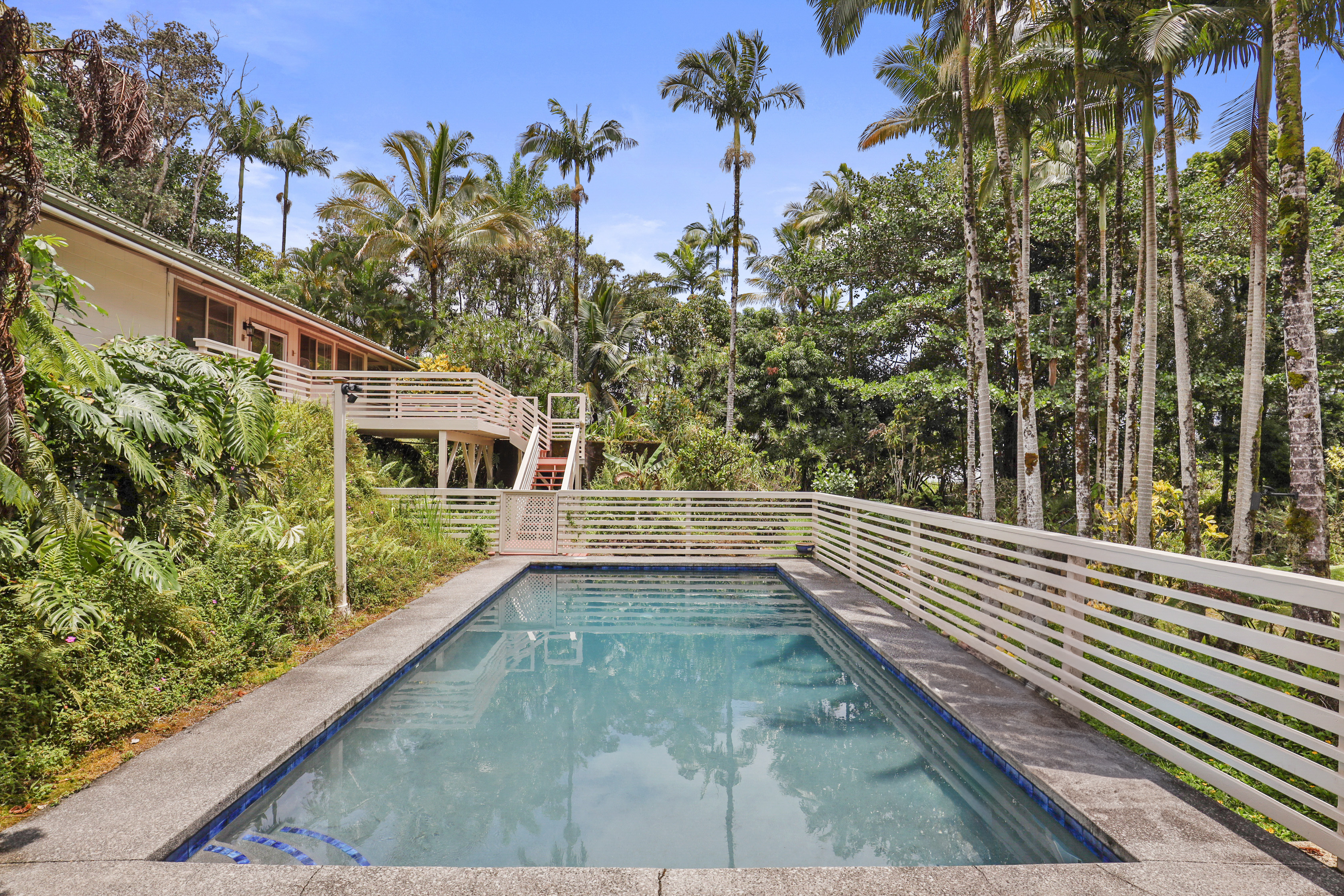 a view of balcony with a lots of trees