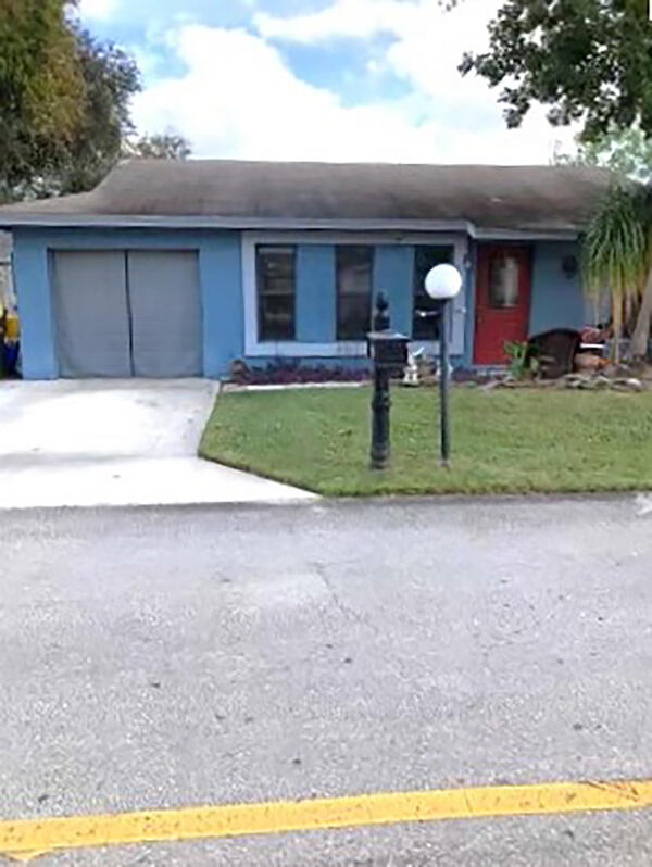 a view of outdoor space yard and front view of a house