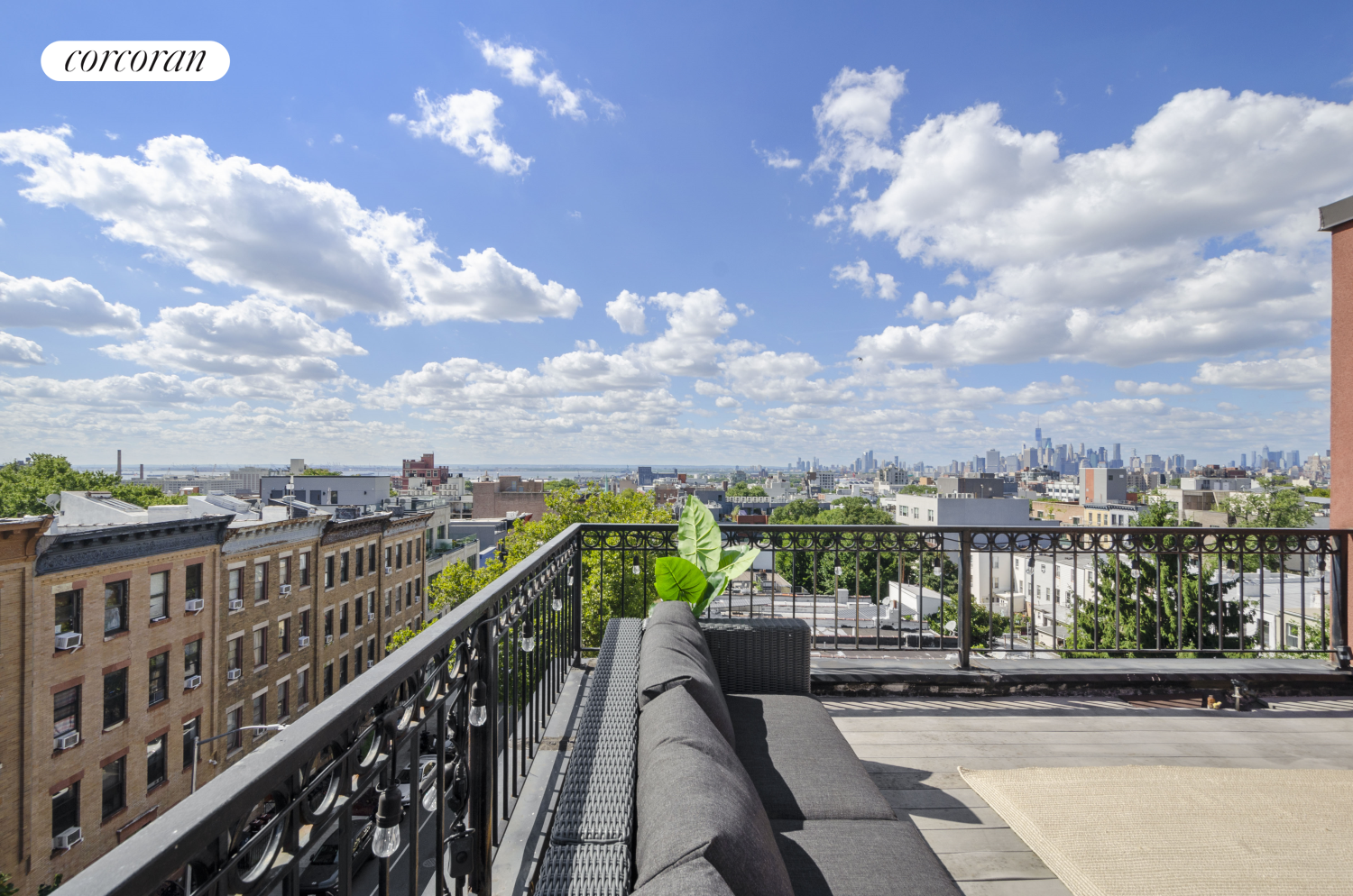 a view of a balcony with city view