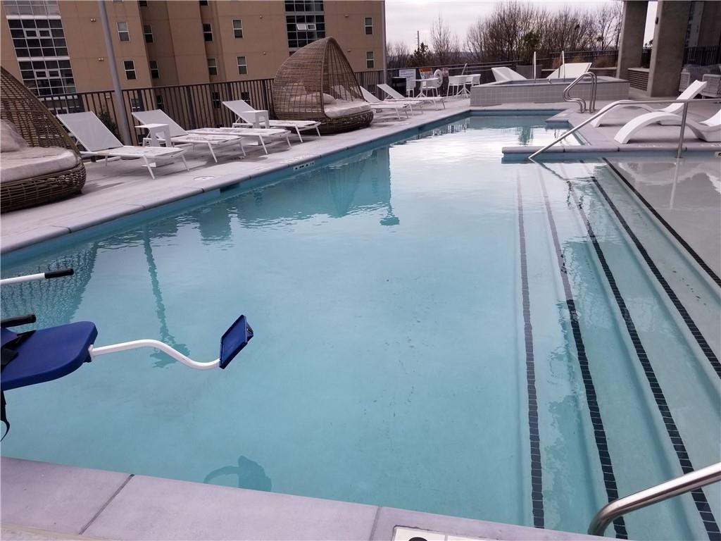 a view of swimming pool from a balcony