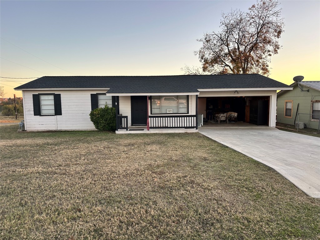 front view of a house with a yard