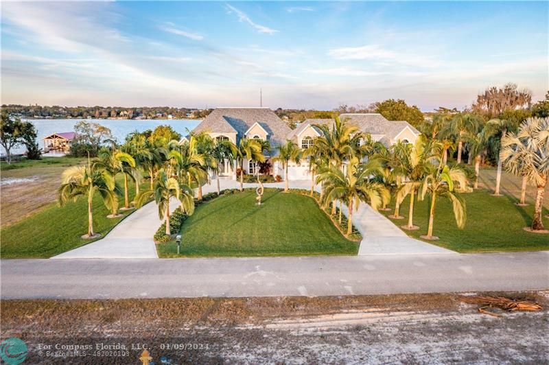 an aerial view of a houses with outdoor space