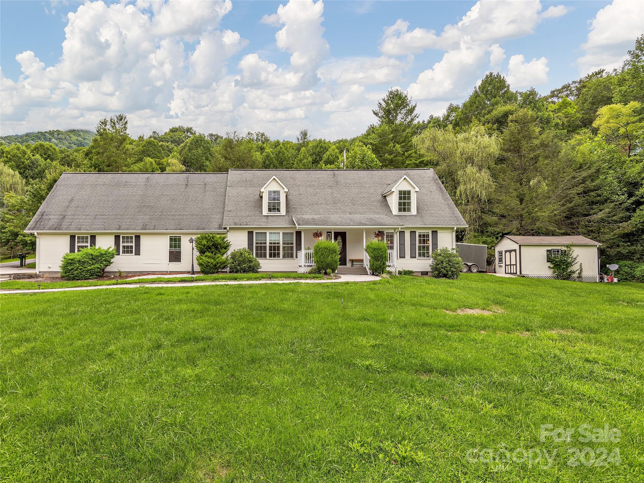 a aerial view of a house with a big yard