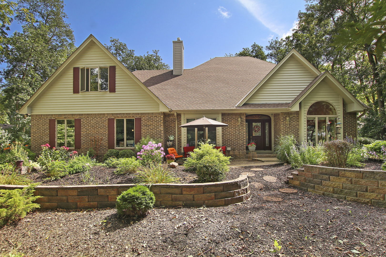 front view of a house with a yard