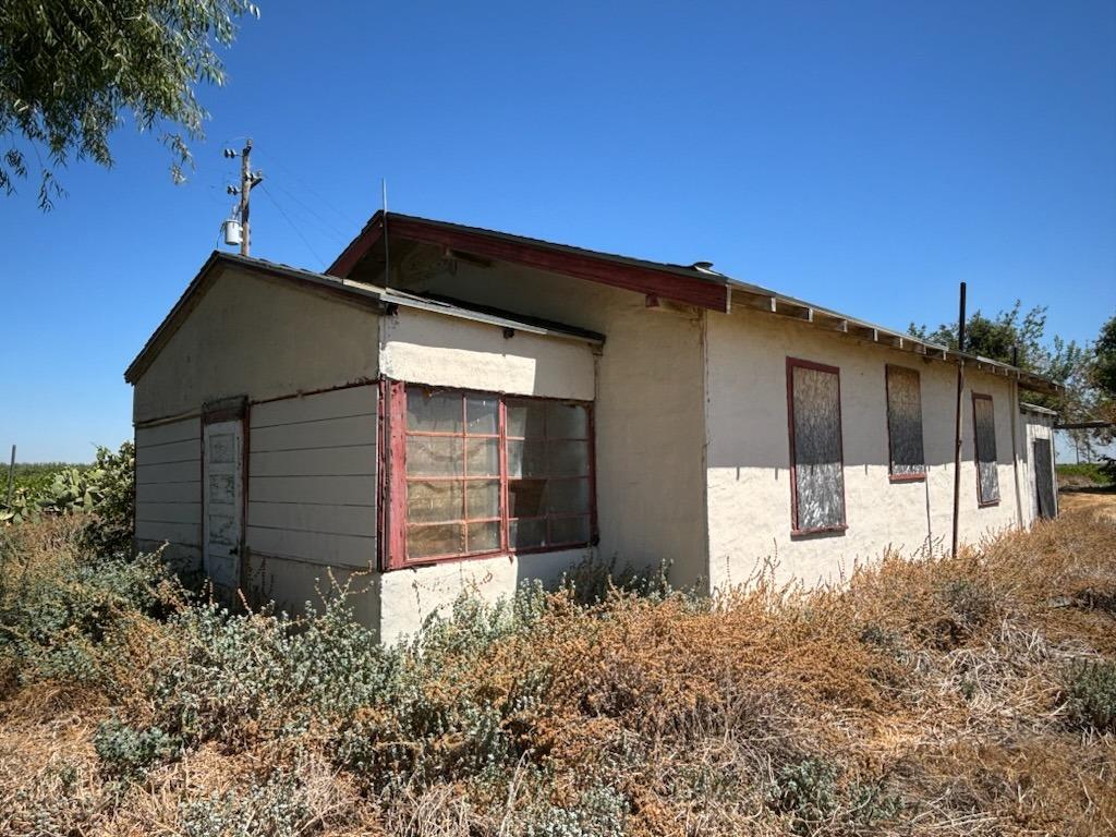 a house with trees in front of it