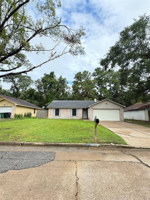 front view of a house and a yard