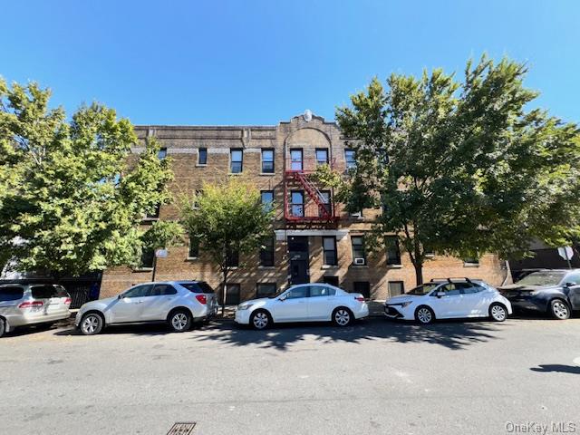 a car parked in front of a house