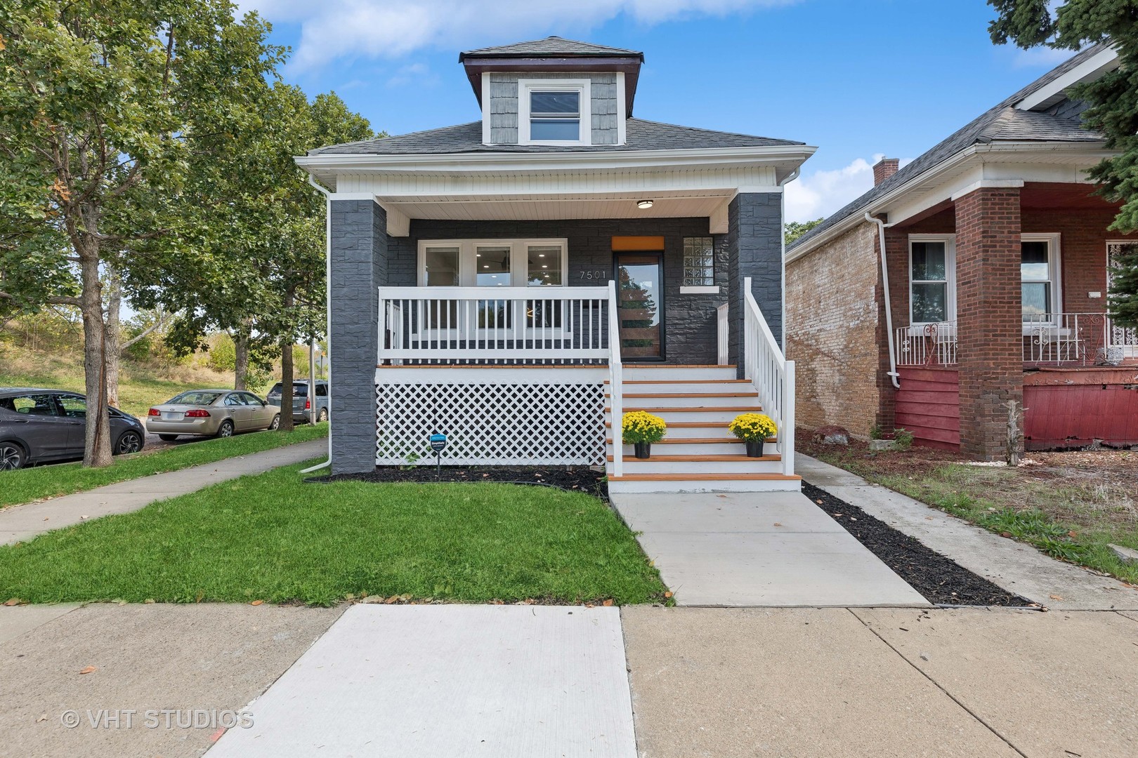 a front view of a house with a yard