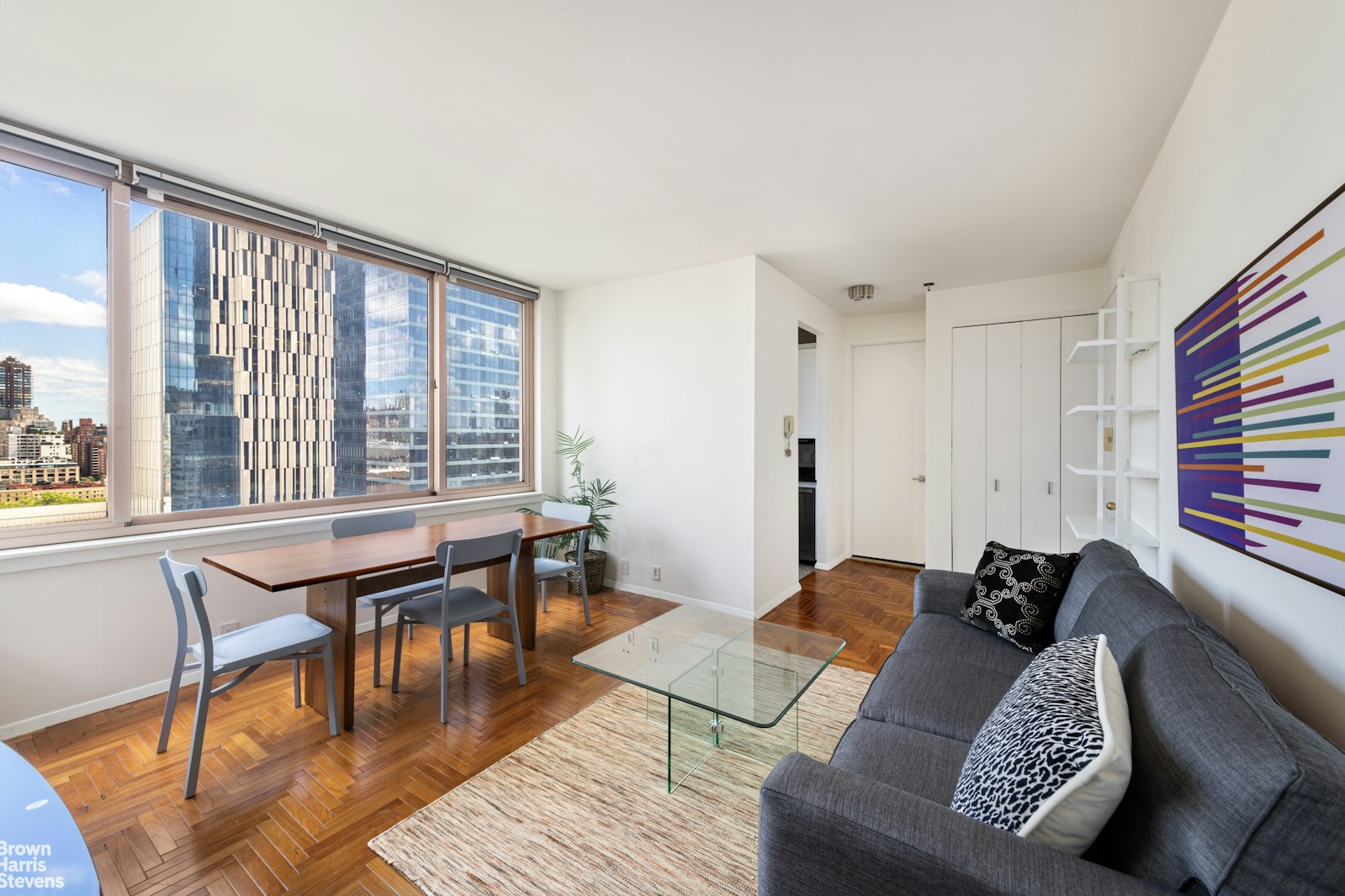 a living room with furniture and a window