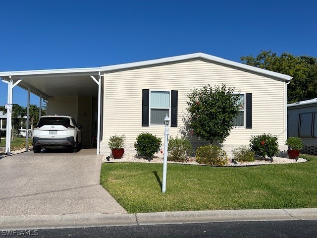 a view of a house with a yard