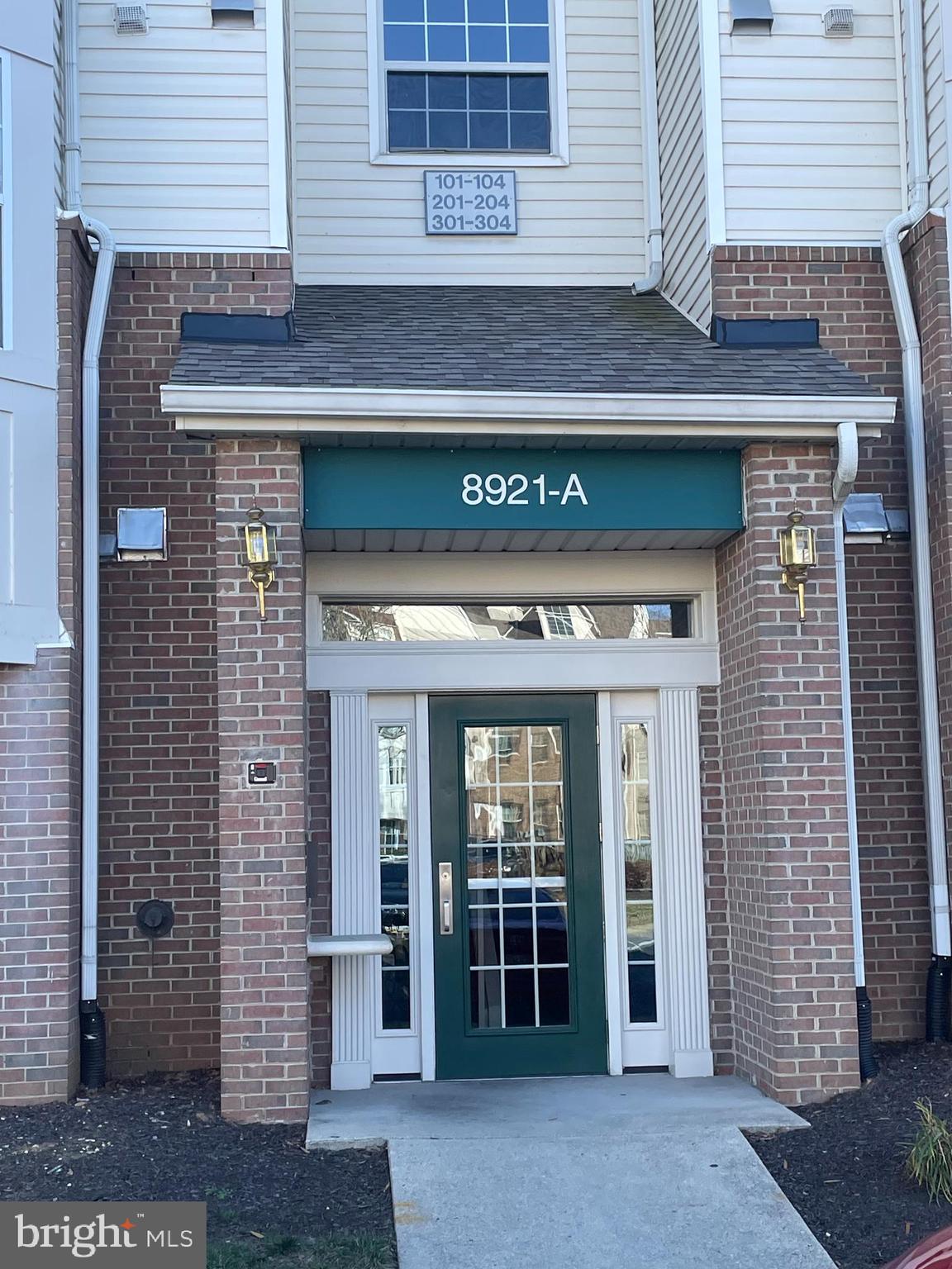 a front view of a building with glass door