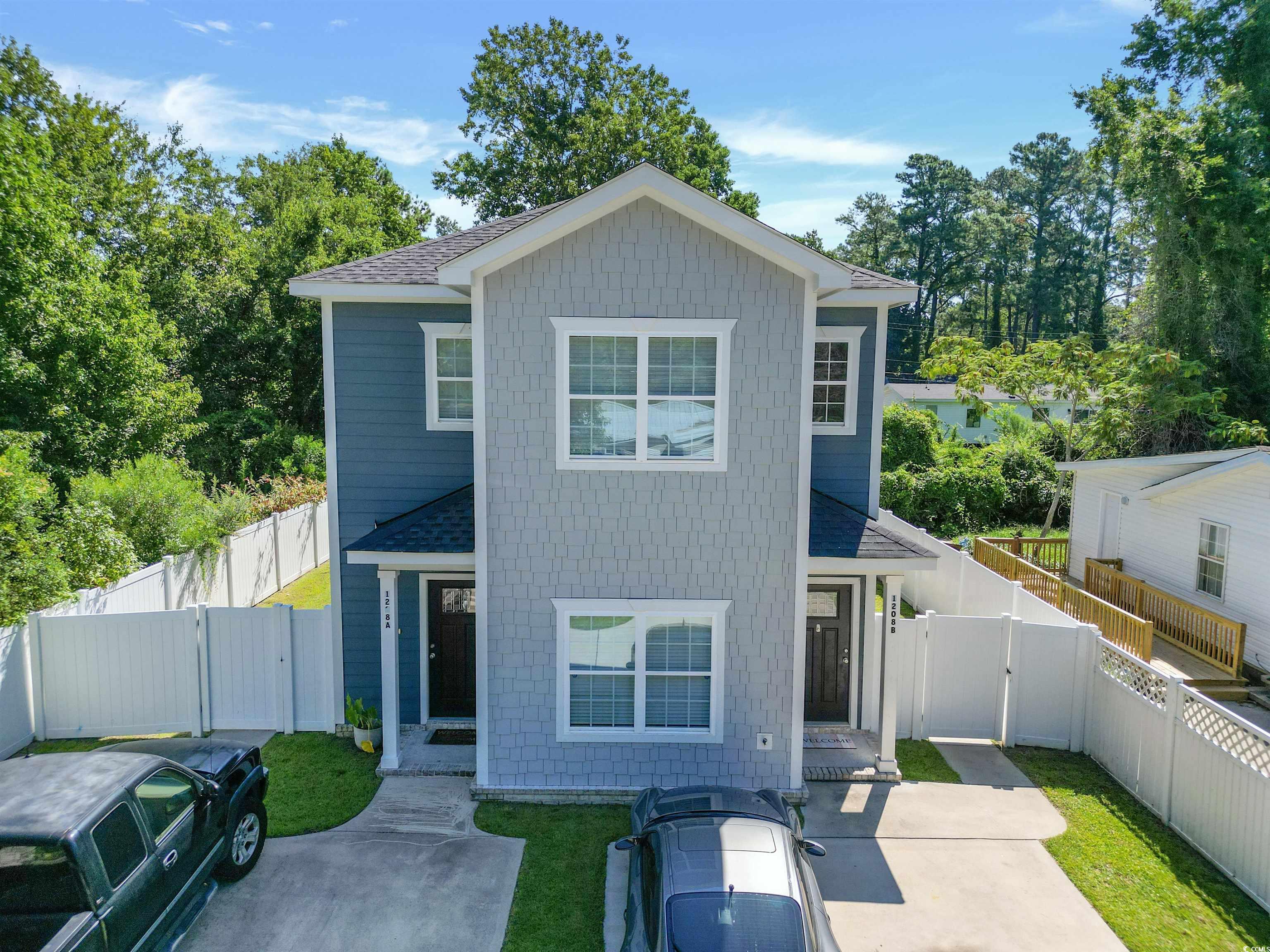 View of front of house with a front yard