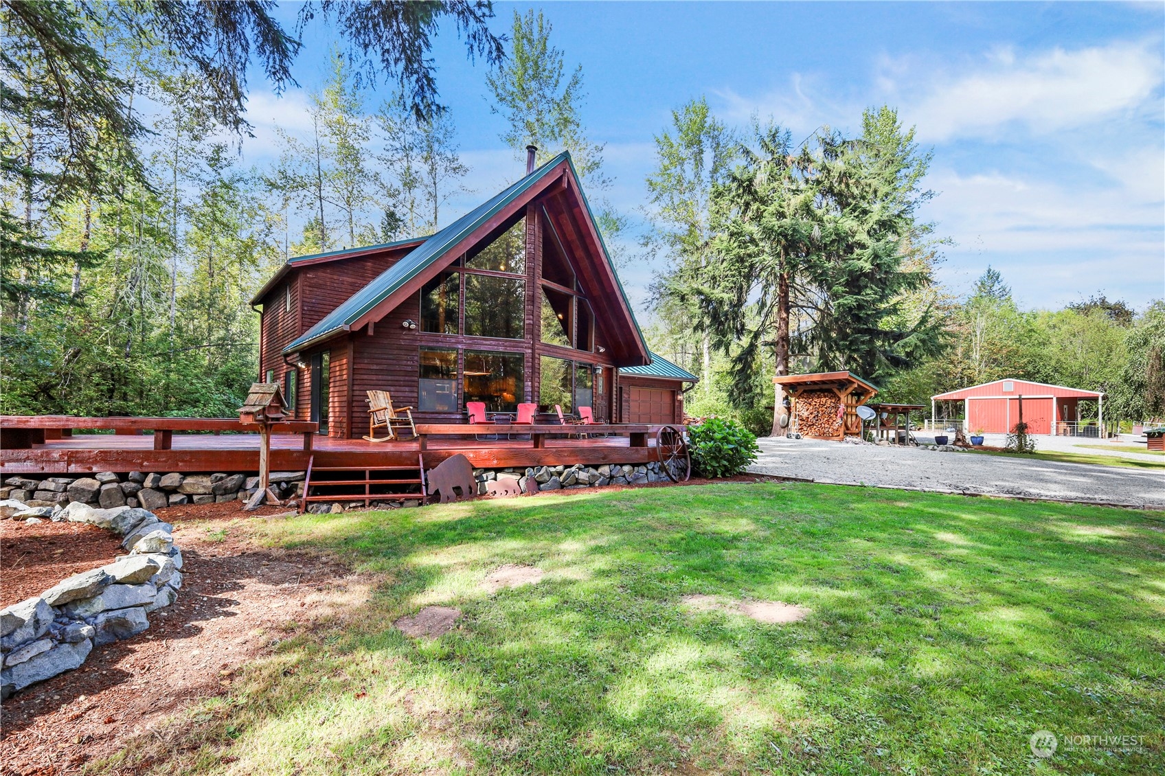 a view of a house with a yard porch and sitting area