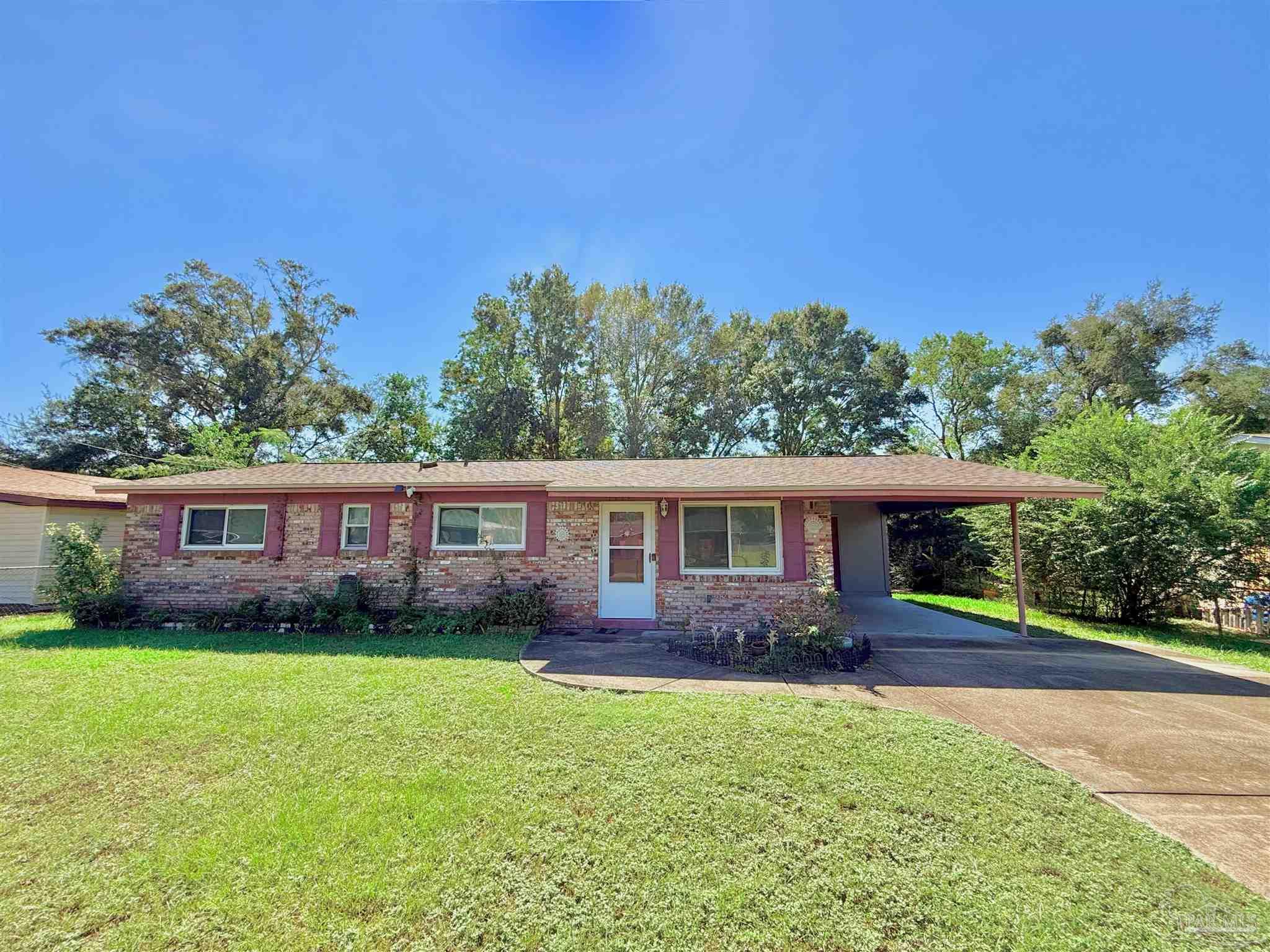 front view of house with a yard