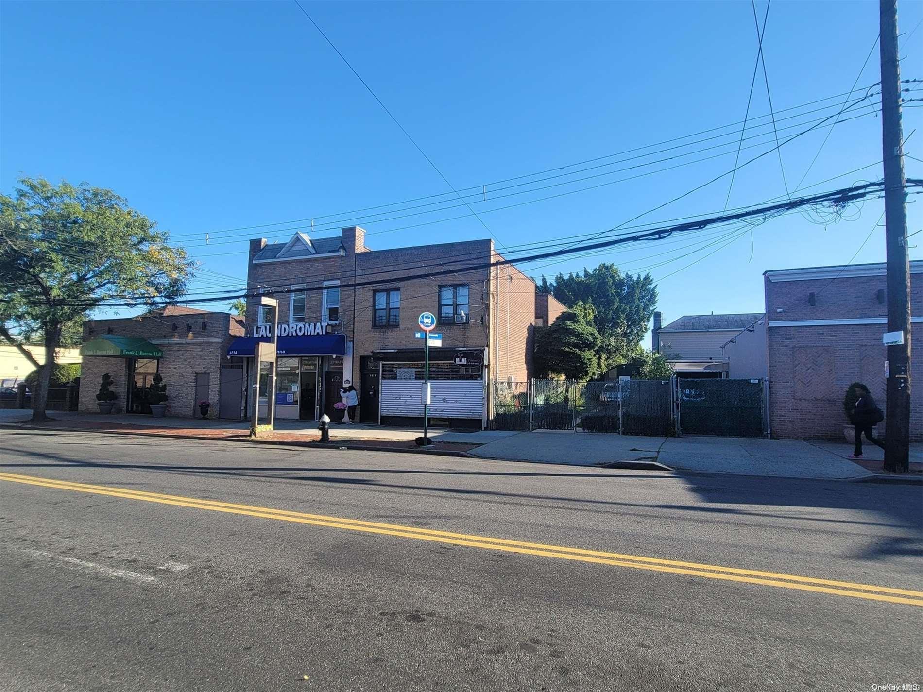 a view of a building with a street