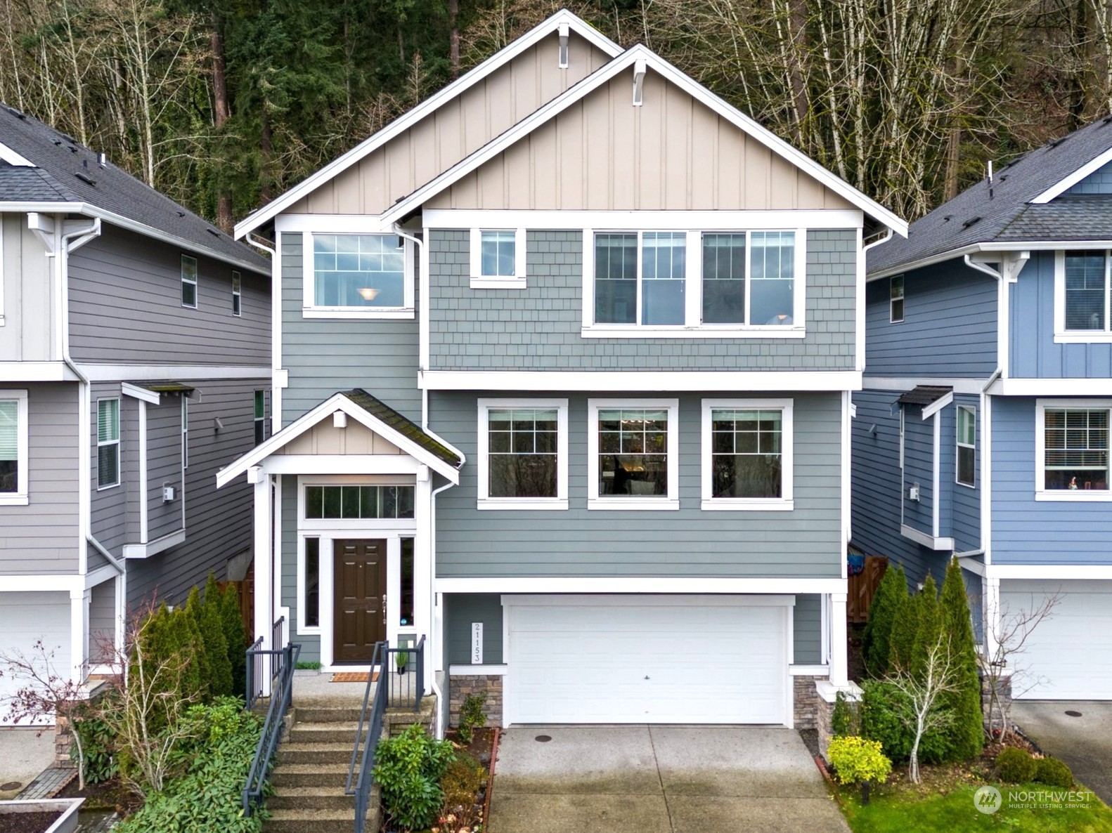 a front view of a house with a yard