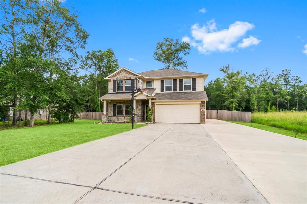 Check out this beautiful home with an extended driveway and large fenced back yard!