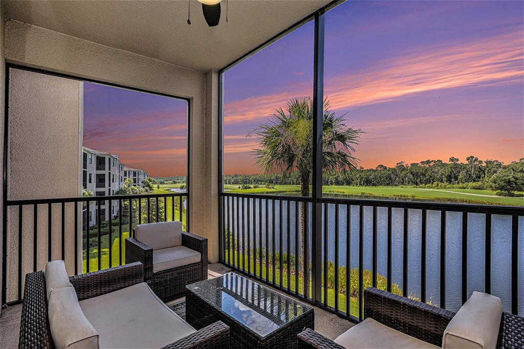 a view of a balcony with furniture