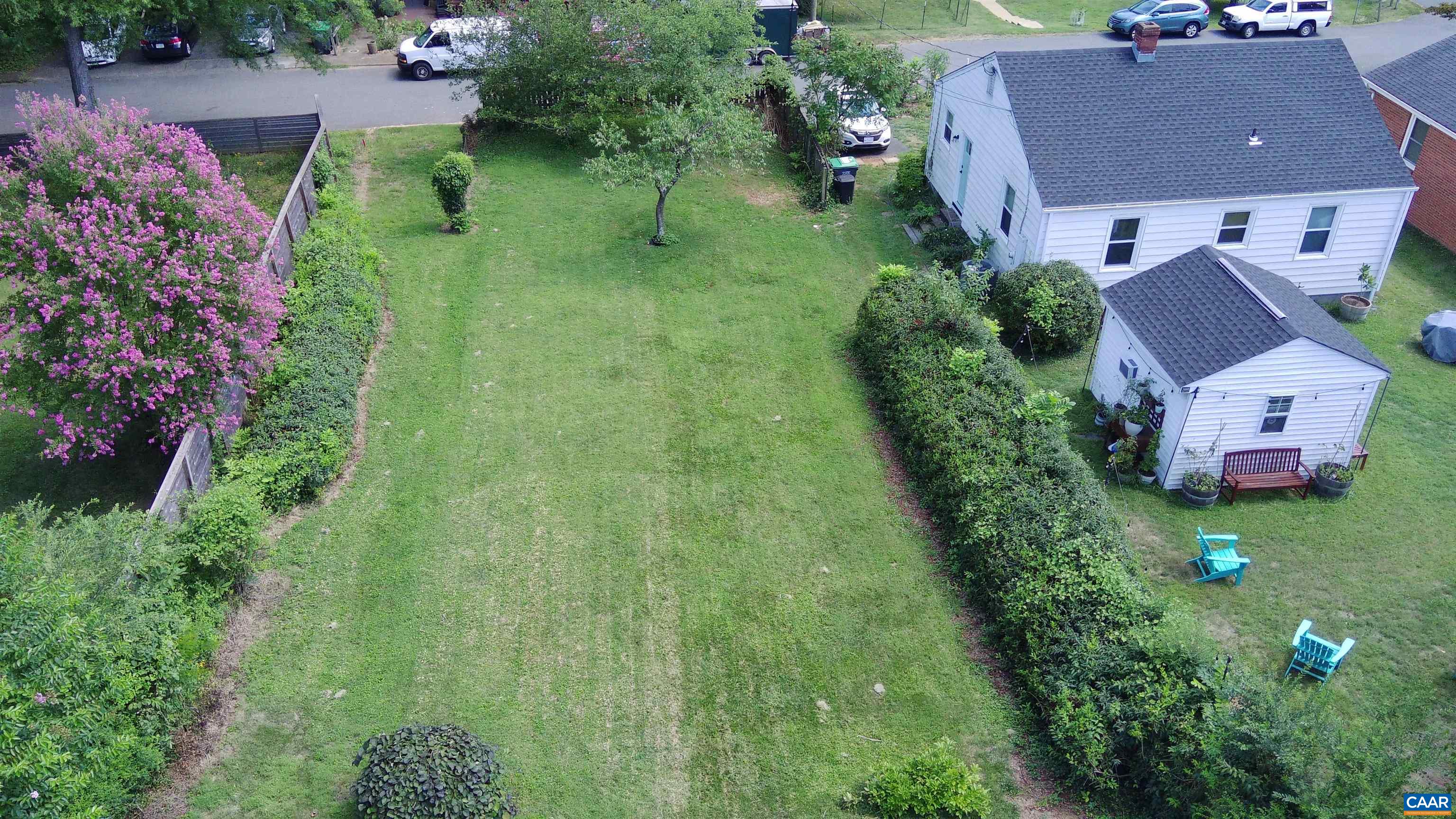 an aerial view of house with yard