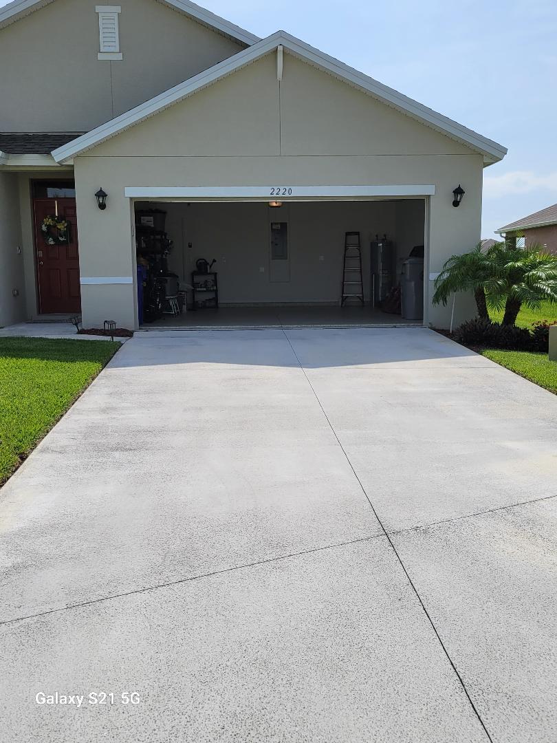 a house with yard and a garage