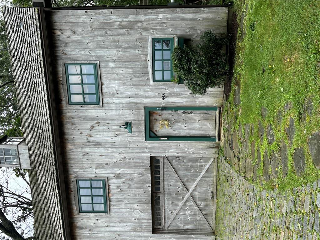 Front entrance and dedicated garage bay.