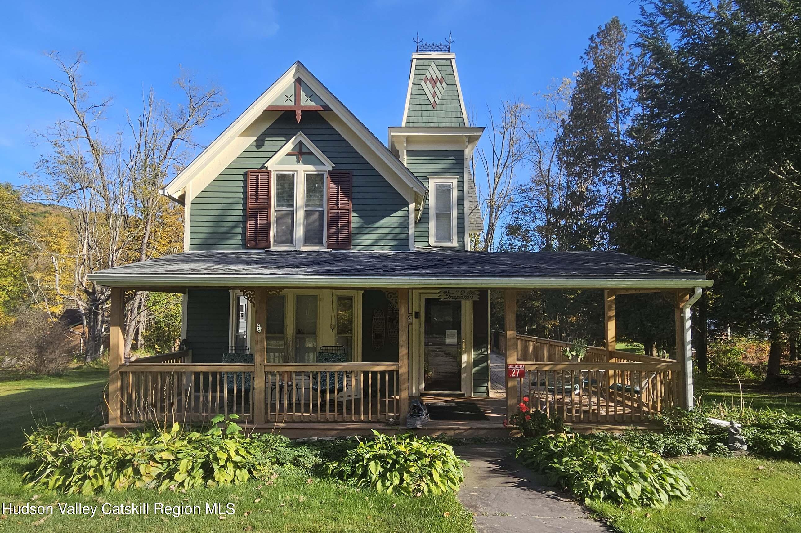 front view of a house with a small yard