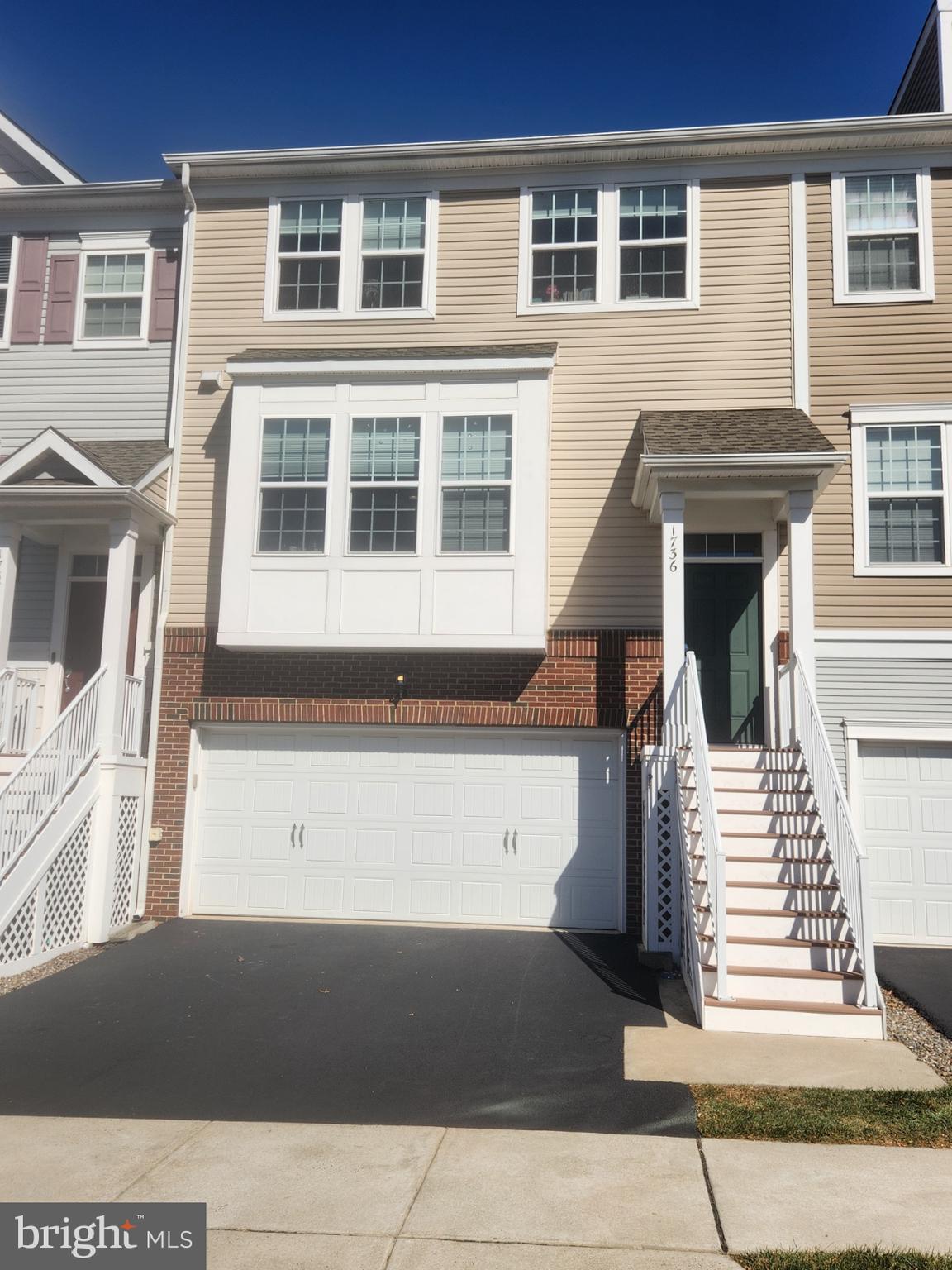 a front view of a house with a door