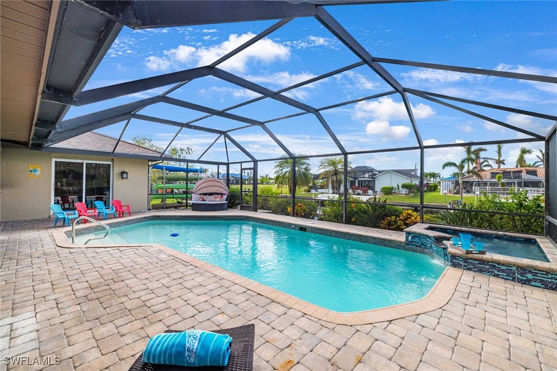 a view of a swimming pool with a porch