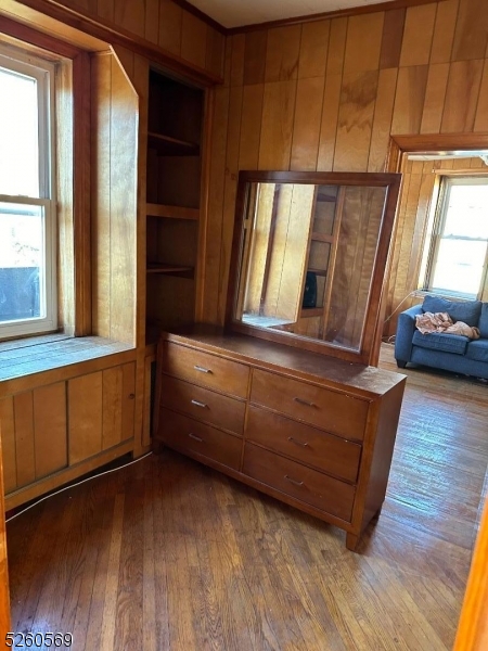 a room with window and wooden floors