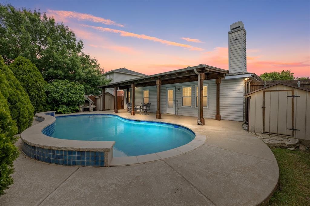 a view of outdoor space with swimming pool