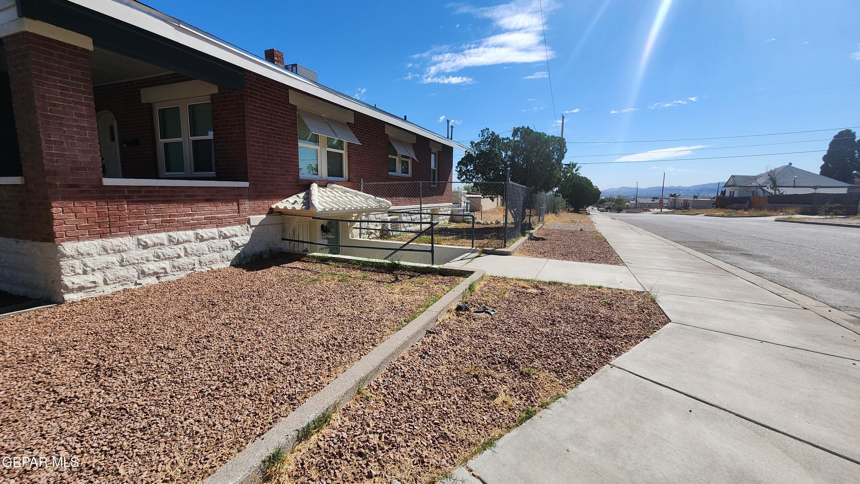 a front view of a house with patio