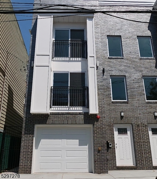 a front view of a house with windows