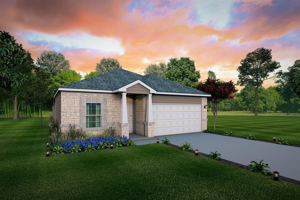 a front view of house with yard and green space