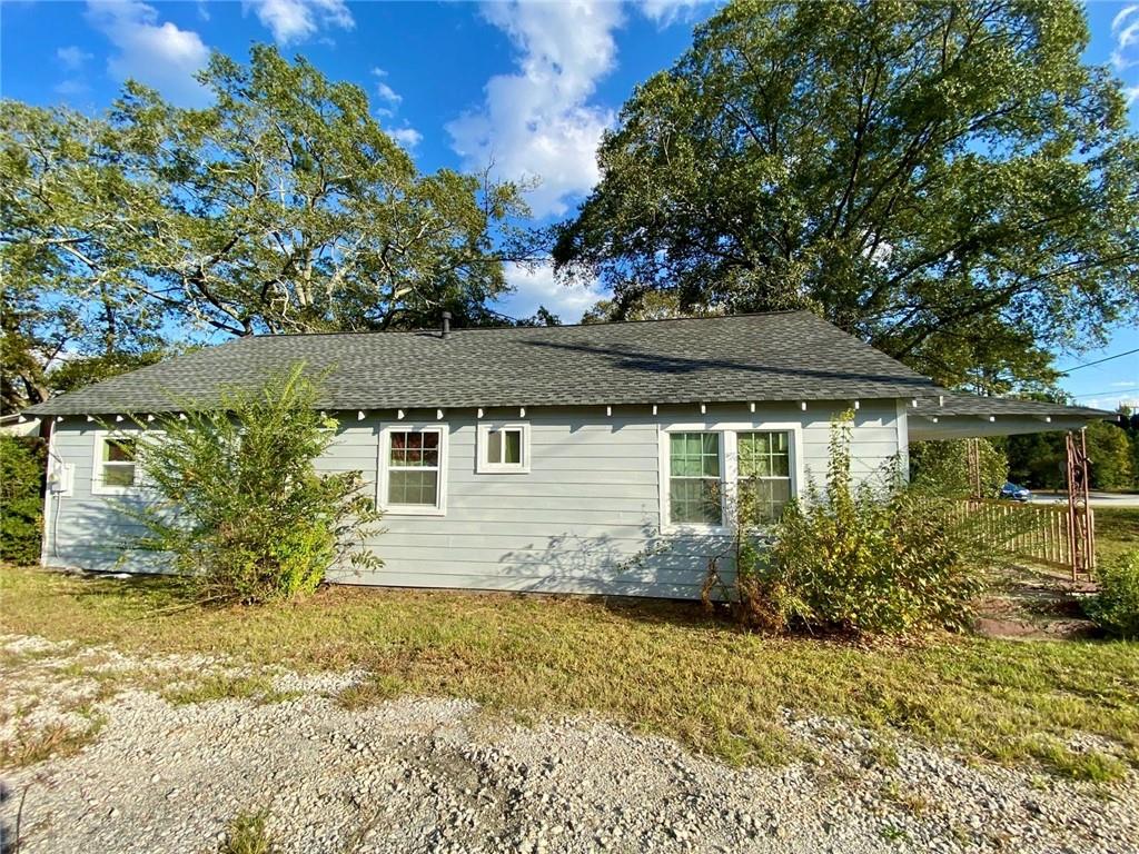 front view of house with a yard