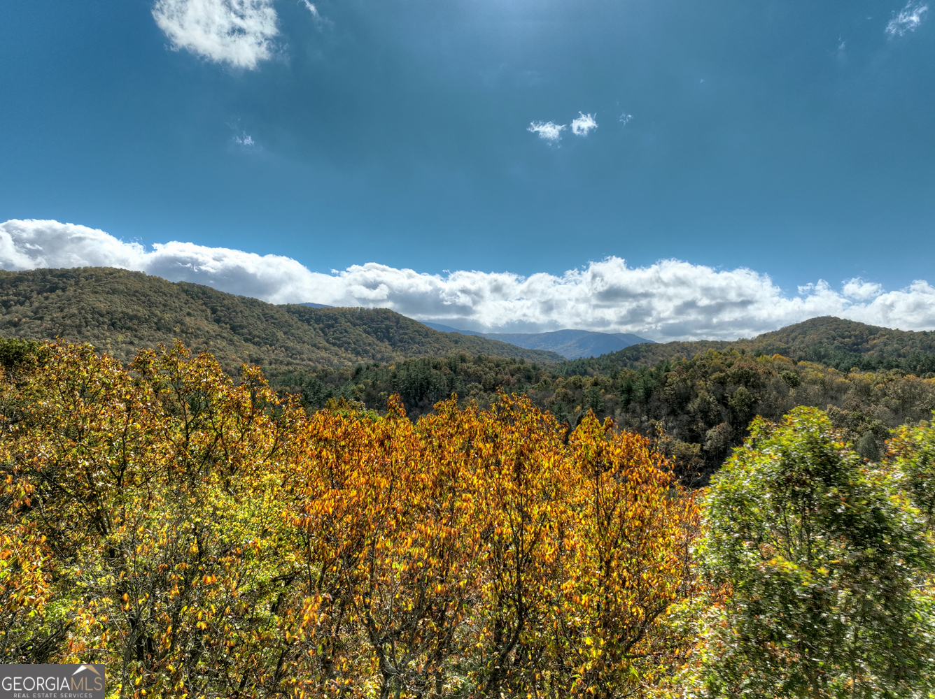 a view of a lot of mountains in the background