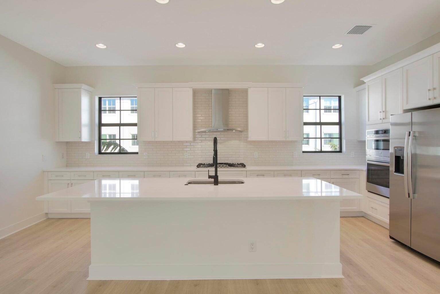 a view of a kitchen with a window