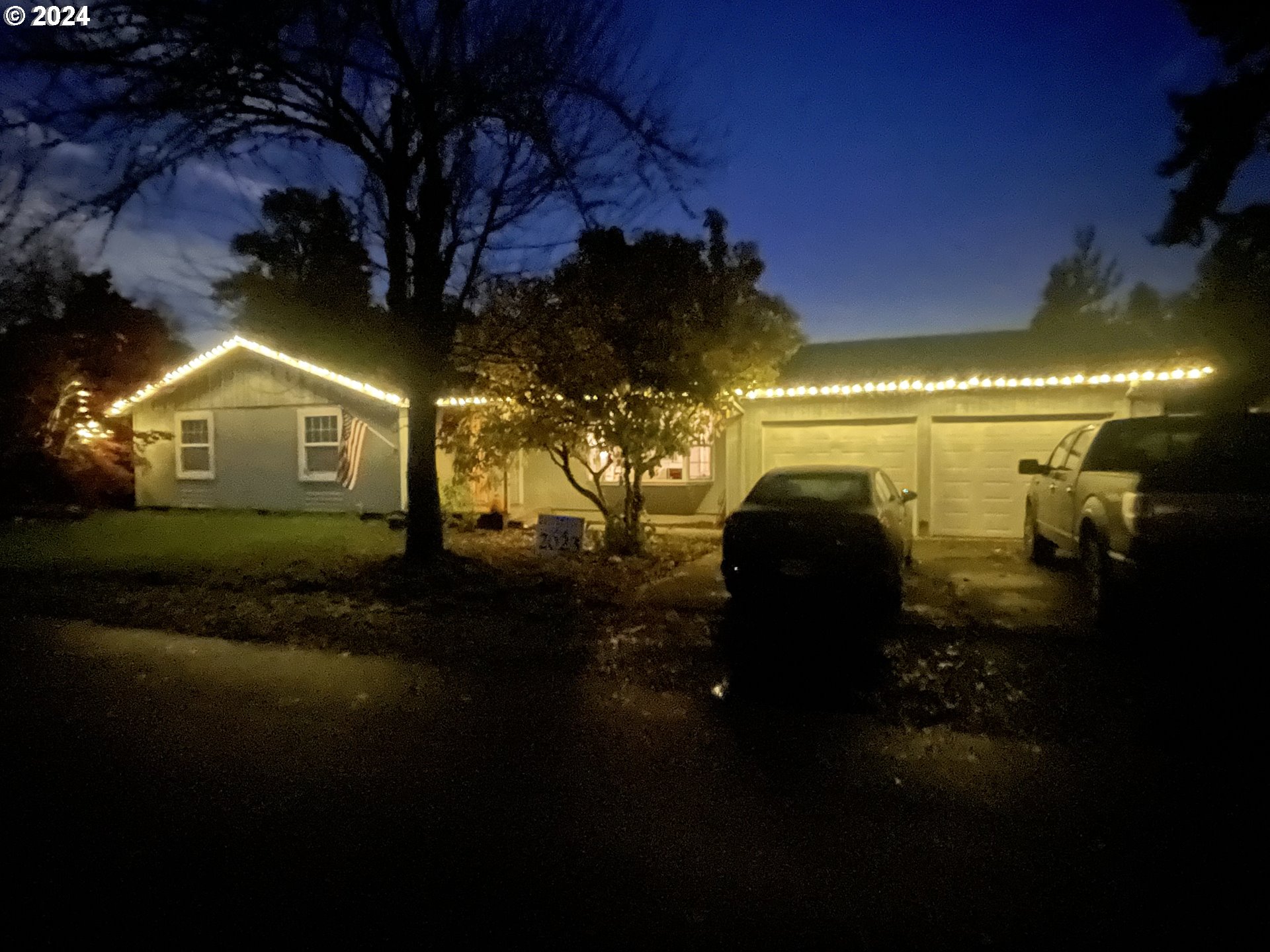 a view of a street both of side of house