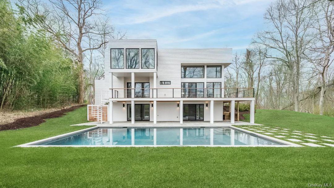 a view of a house with a swimming pool