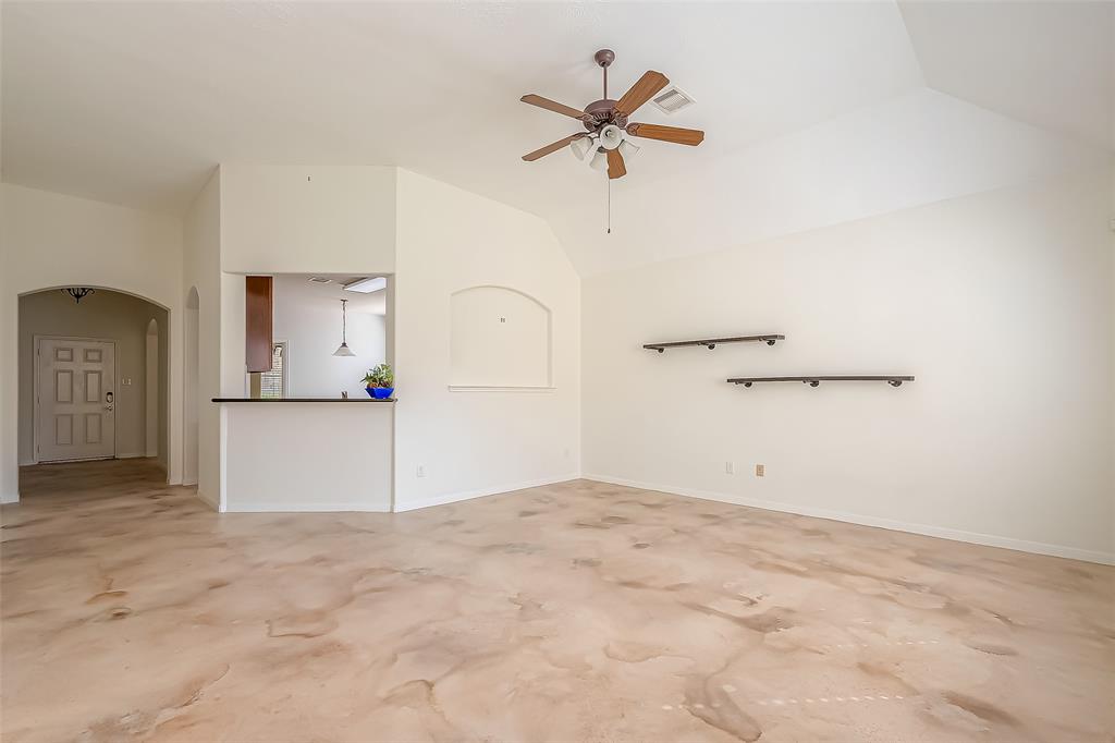 Large living room open to the kitchen.