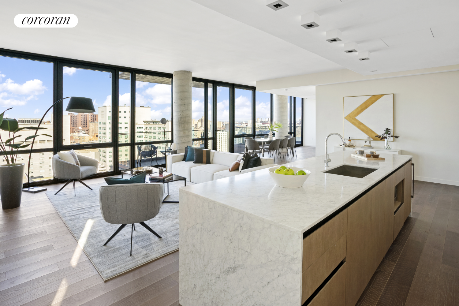 a living room with dining table and a large window