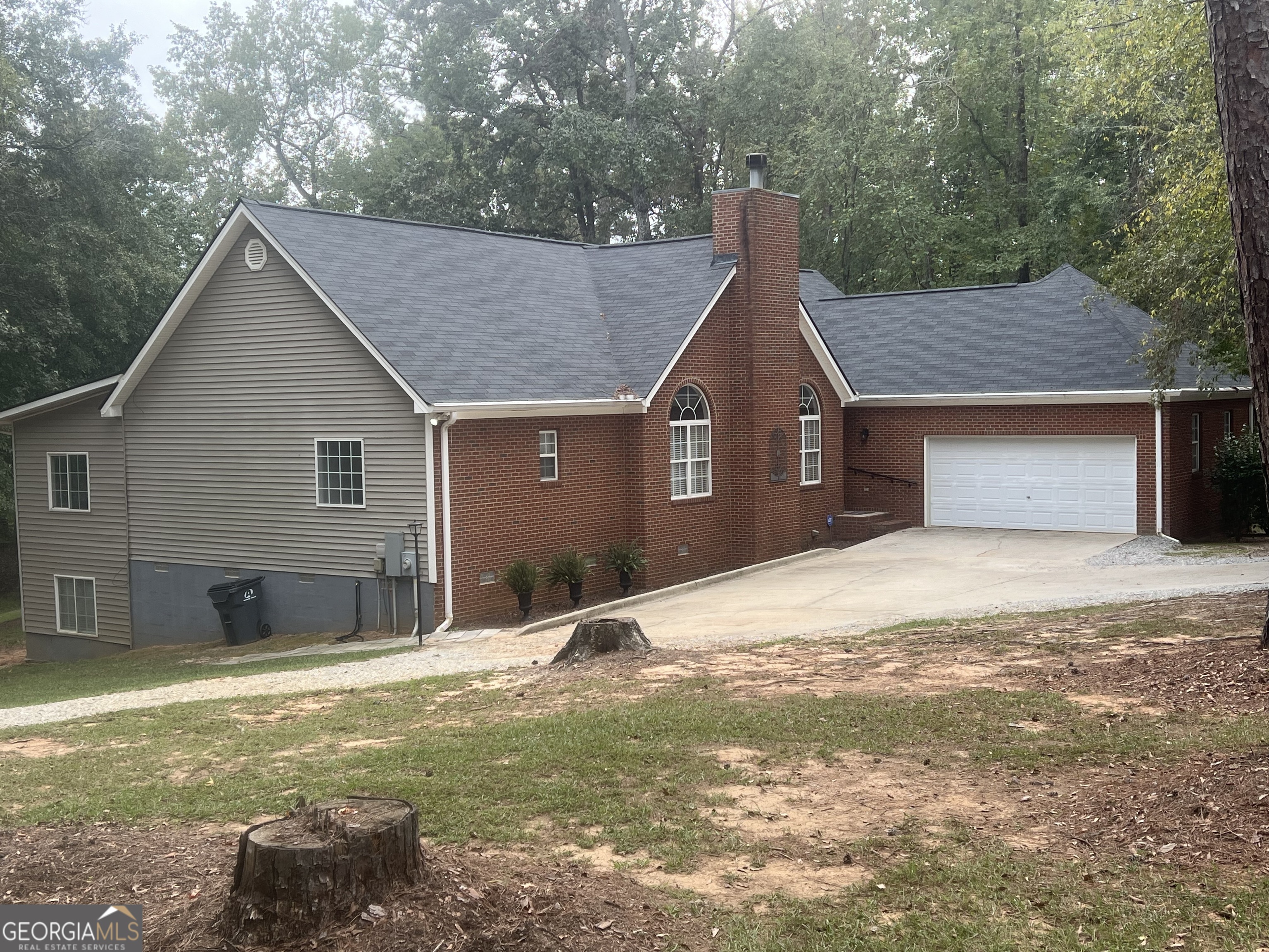 a house with yard in front of it