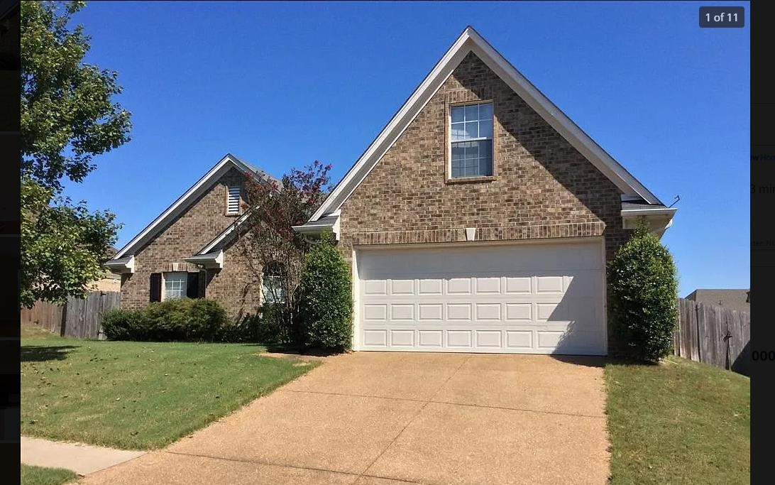 a front view of house with yard